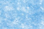 stock photo of glisten  - Glistening ice crystals lie on the background of the snow surface - JPG 