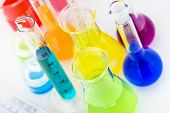 foto of science  - Scientific laboratory glassware filled with colored liquid ready for chemical experiment in a science research lab - JPG 