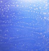 stock photo of conglomerate  - abstract wet blue background with soap bubble conglomerations - JPG 