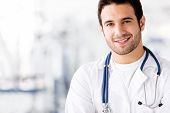 foto of health  - Portrait of friendly male doctor smiling - JPG 