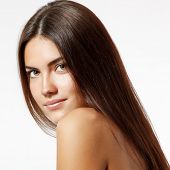 picture of cheerful  - young woman beautiful cheerful enjoying with long strong brown hair isolated on white background - JPG 