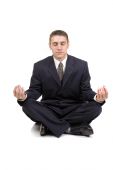 picture of construction worker  - Young businessman in yoga position on white - JPG 
