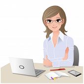 stock photo of computer  - Young woman wearing glasses at desk with laptop computer and mobile phone - JPG 