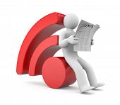 stock photo of newspaper  - Person reading RSS news - JPG 