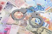 image of currency  - Currency from world with handcuffs - JPG 