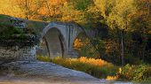 stock photo of bridge  - Beautiful autumn sunrise at the Interurban bridge in Toledo Ohio - JPG 