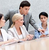 pic of meeting  - Business people discuss something at the meeting at the modern office building - JPG 