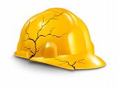 image of health  - Work accident and health hazards on the job as a broken cracked yellow hardhat helmet as a symbol of working injury and insurance claims from physical damage and pain to the worker - JPG 