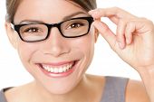 pic of twenties  - Eyewear glasses woman happy holding showing her new glasses smiling on white background - JPG 