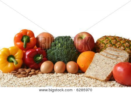 Picture or Photo of Variety of fresh healthy foods fruits vegetables whole grains and dairy.