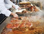 stock photo of food  - fresh meat food grill man outdoor on food shop - JPG 