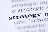 stock photo of strategy  - the word strategy written in a thesaurus - JPG 