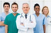 image of medical doctors  - Smiling team of doctors and nurses at hospital - JPG 