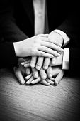 picture of handshake  - Image of business partners hands on top of each other symbolizing companionship and unity - JPG 