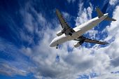 foto of blue sky  - view from the bottom of an aircraft landing with the sky background - JPG 