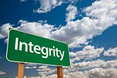 foto of integrity  - Integrity Green Road Sign with Copy Room Over The Dramatic Clouds and Sky - JPG 
