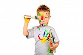 picture of kindergarten  - Portrait of a little boy enjoying his painting - JPG 