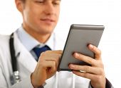 picture of medical doctors  - Handsome doctor using computer plane - JPG 