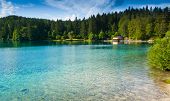 stock photo of hut  - View of lower lake and hut in Fusine Tarvisio Friuli Italy - JPG 