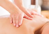 image of attractive  - Attractive Woman Having A Massage With Massage Oil In A Spa - JPG 