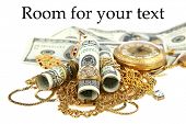 picture of watch  - "Cash for gold" or "Cash 4 Gold" a leather pouch filled with gold jewelry lays upon a pile of cash isolated on white with room for your text. represents CASH FOR GOLD business concepts - JPG 