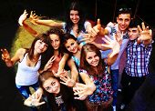 picture of group  - A group of young people dancing at a disco - JPG 
