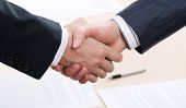 image of business people  - Business people joining hands together for deal - JPG 