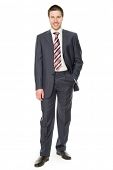 picture of businessmen  - Portrait of a smiling young businessman standing against isolated white background - JPG 
