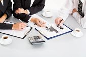 foto of meeting  - Image of business people hands working with documents at meeting - JPG 